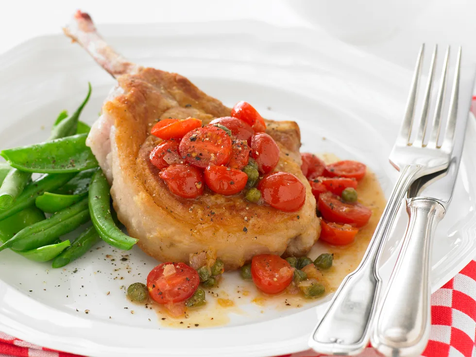 Pork cutlets with tomato and capers