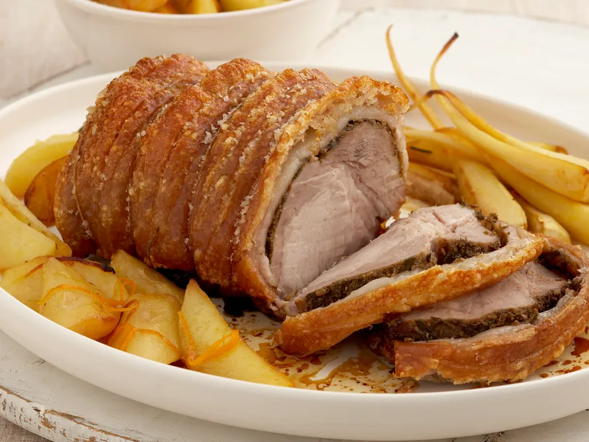 Roast pork with potato, parsnip and pear