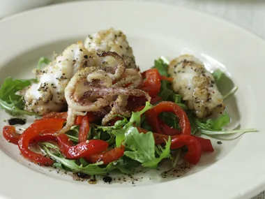 Salt and pepper calamari with roasted capsicum salad