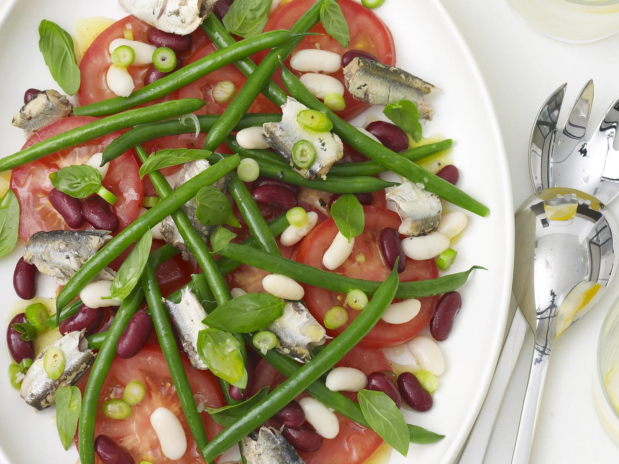 Sardines with bean and tomato salad