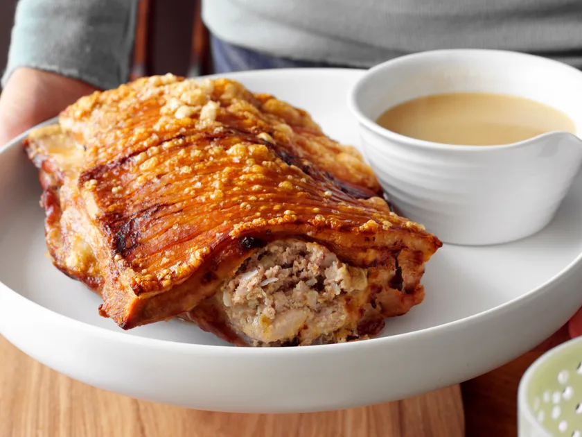 Stuffed roast pork with gravy