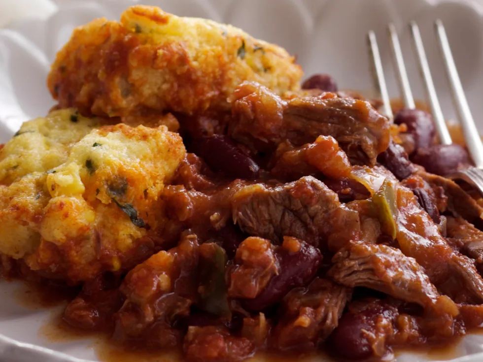 Chilli con carne with corn dumplings