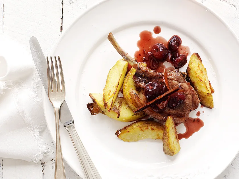 Pork cutlets with roasted cherries