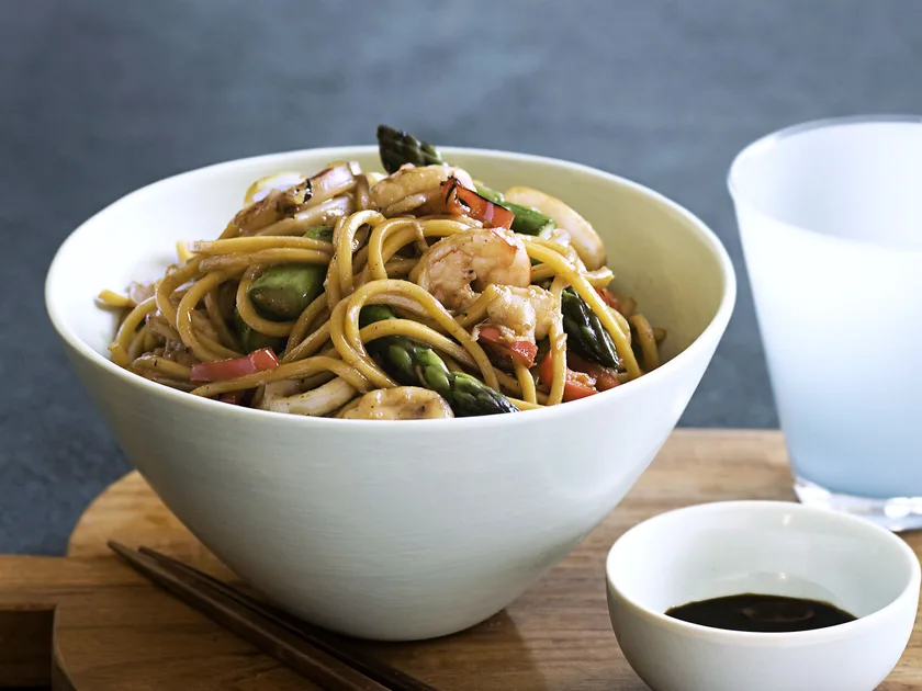 Prawn, calamari, asparagus and sesame stir-fry