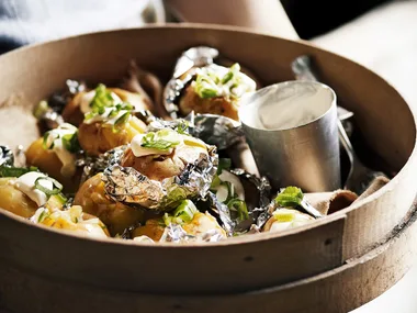 Potatoes with green onion and horseradish cream