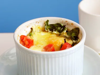baked eggs with bacon and Tomato