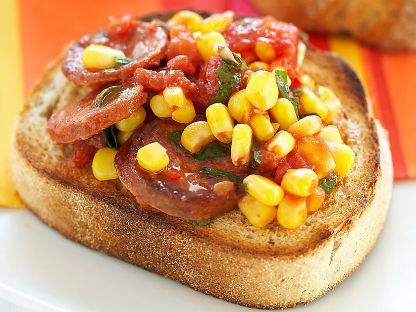 Chorizo, tomatoes and corn on toast