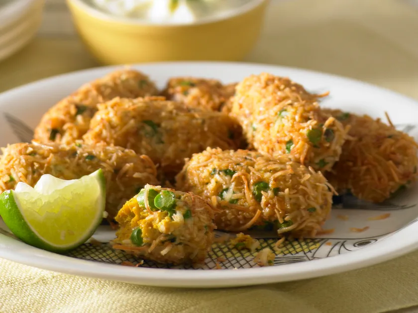 Coconut fish fingers with pineapple raita