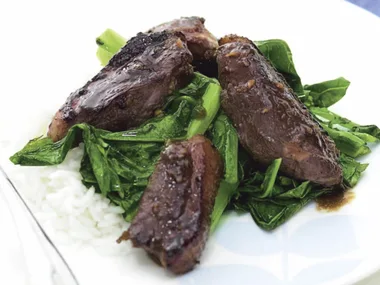 Crispy duck break with gai lan