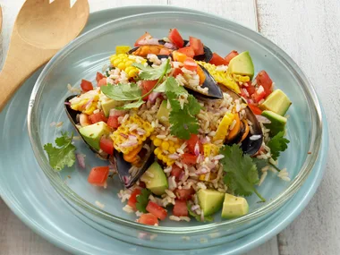 rice salad with mussels, avocado corn and lime