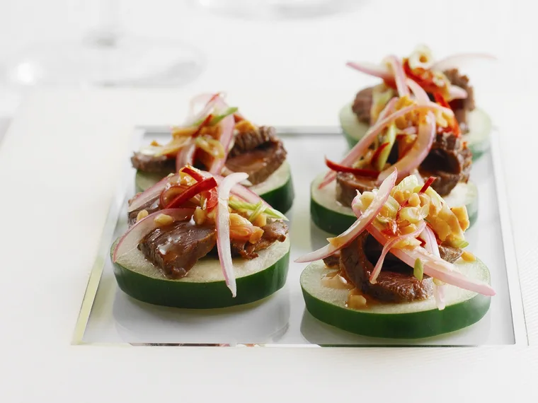 Thai beef salad on cucumber rounds