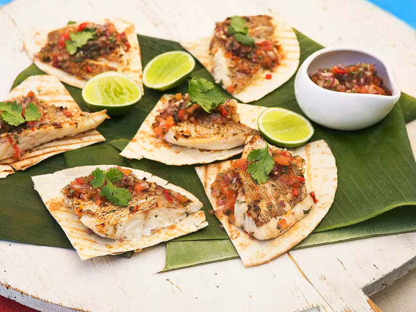 Grilled fish with tomato salsa