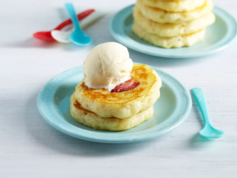 Pancakes with strawberries and vanilla ice-cream