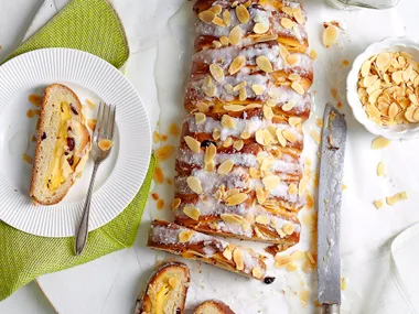 plaited cranberry, orange and coconut custard loaf