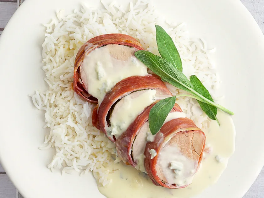 Prosciutto-wrapped pork with blue cheese sauce