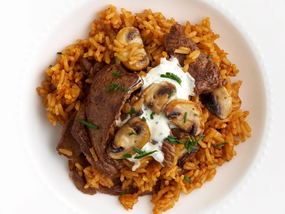 Red pilaf with beef and mushrooms