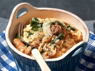 Sausage and mushroom risotto with baby spinach
