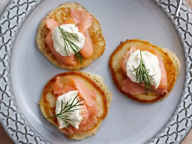 Smoked salmon blini with sour cream topping