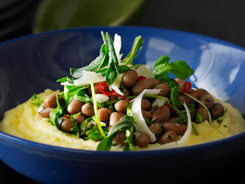 Soft polenta with borlotti beans and rocket