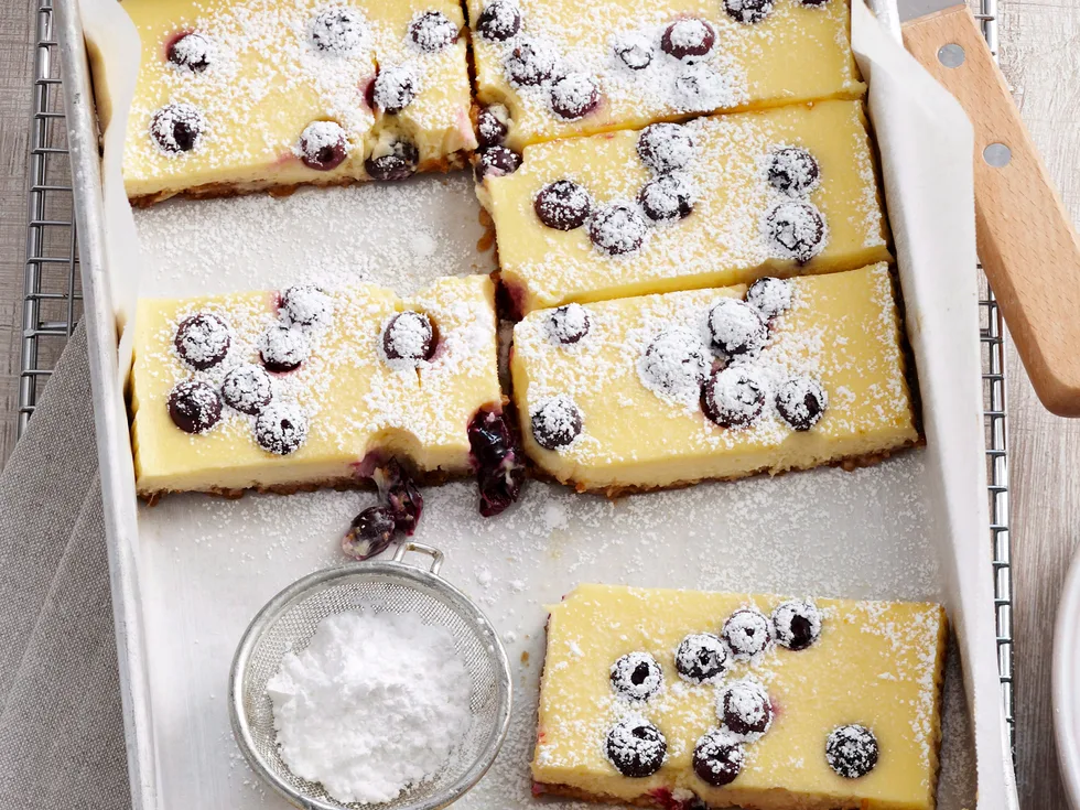 Sour cream and blueberry cheesecake slice