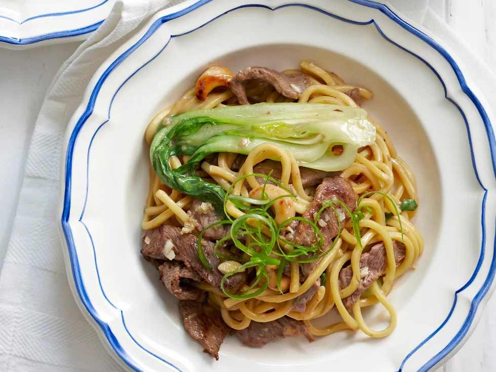 Stir-fried beef with cashews and bok choy