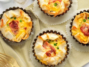 Mini pancetta, pea and egg filo tarts