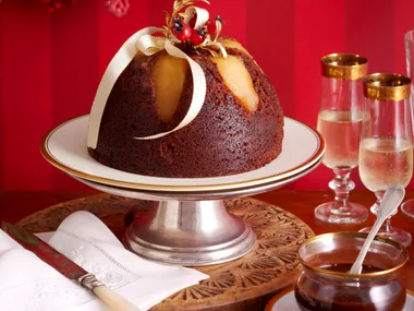 Upside-down pear pudding with choc hazelnut sauce