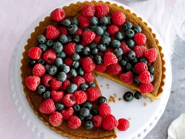 Berry and Macadamia tart with maple ricotta Cream