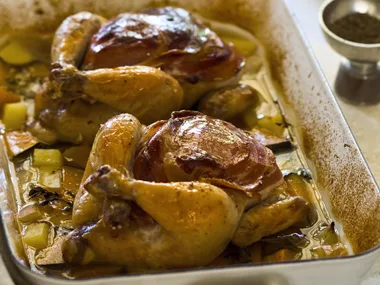 Pancetta-wrapped poussin with roasted vegetable broth