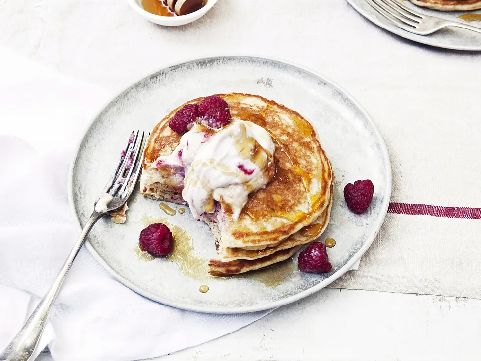 Buttermilk pancakes with raspberry ricotta and maple syrup