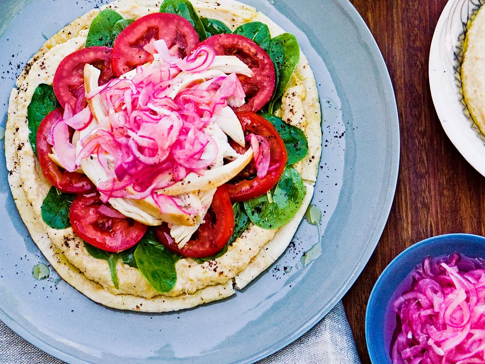 Chicken pita with homemade hommus and sweet red onions