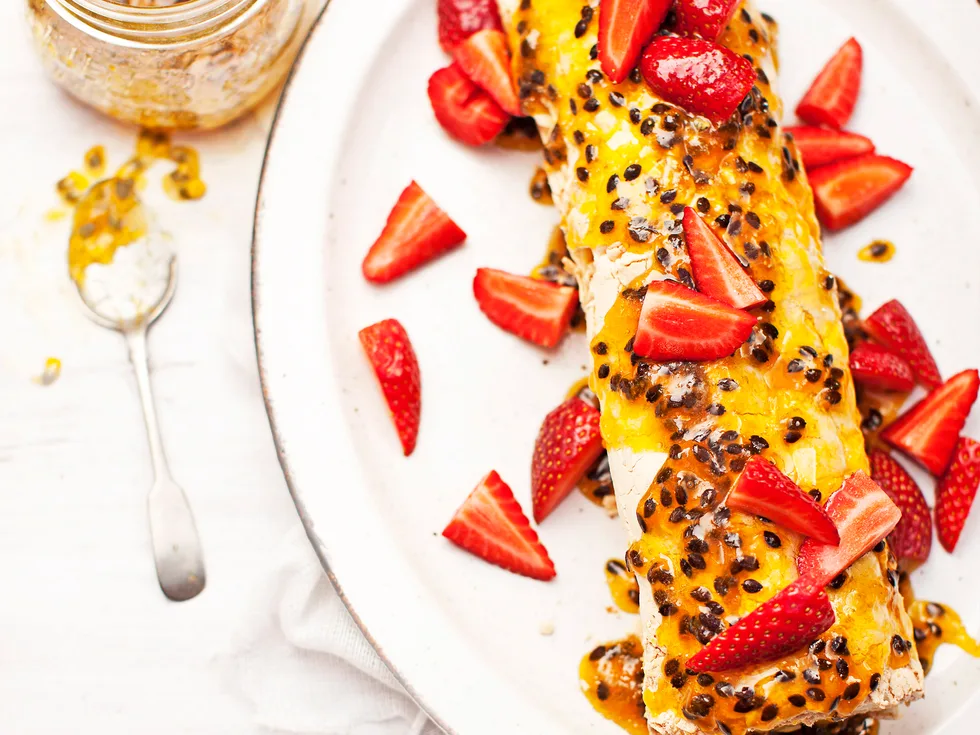 Pavlova roulade with passionfruit and lime syrup