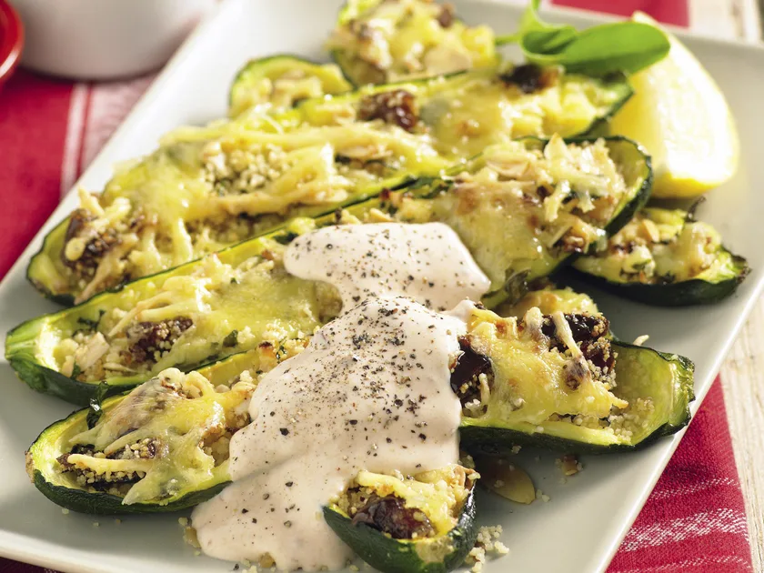 Couscous-stuffed zucchini with harissa yoghurt