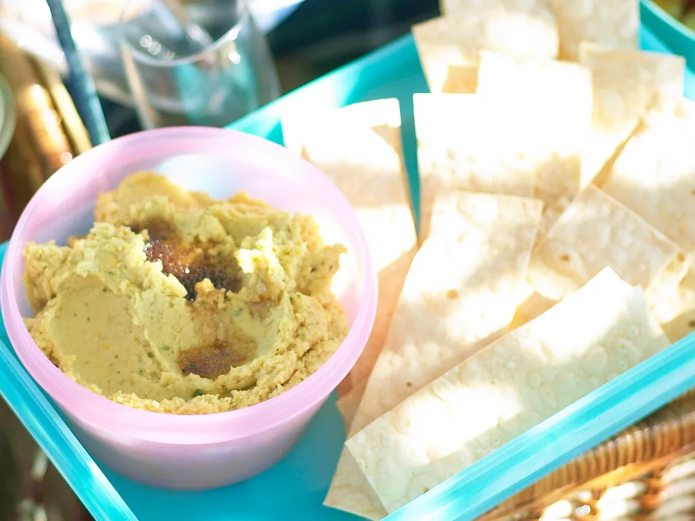 cumin and orange spiced hummus with lavish crisps