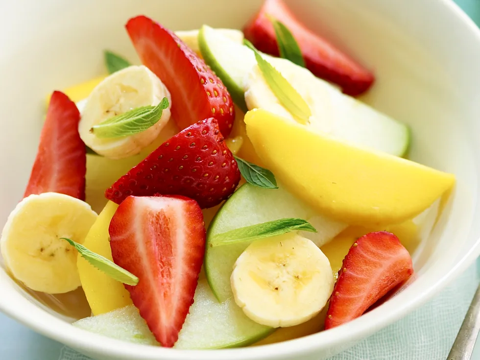 Fruit salad with mint and lime yoghurt