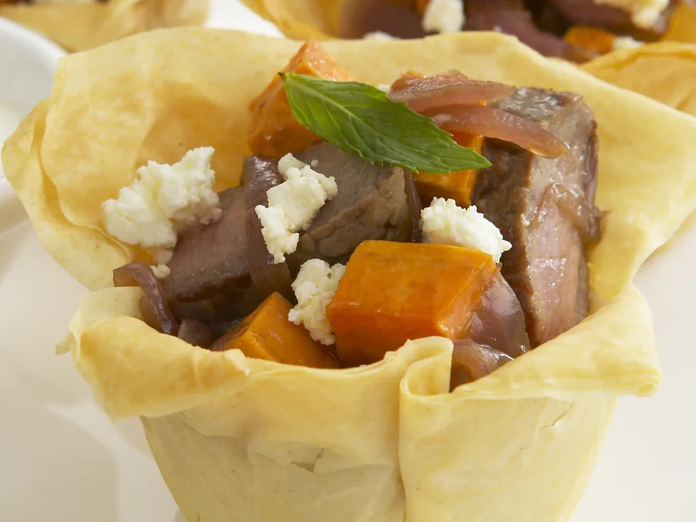 lamb, caramelised onion and kumara baskets