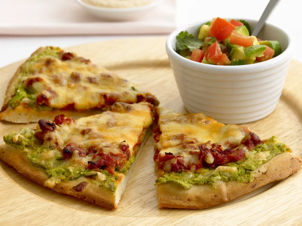 Mexican pizza with avocado salsa