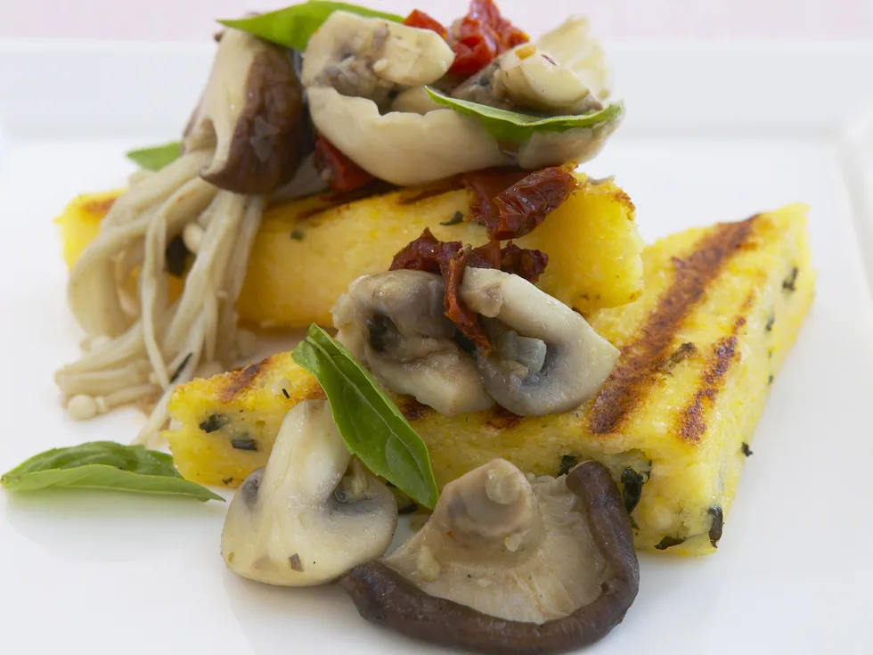 saut‚ed mushrooms on grilled polenta