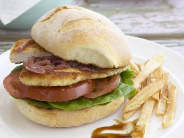 schnitzel burger with caramelised onions