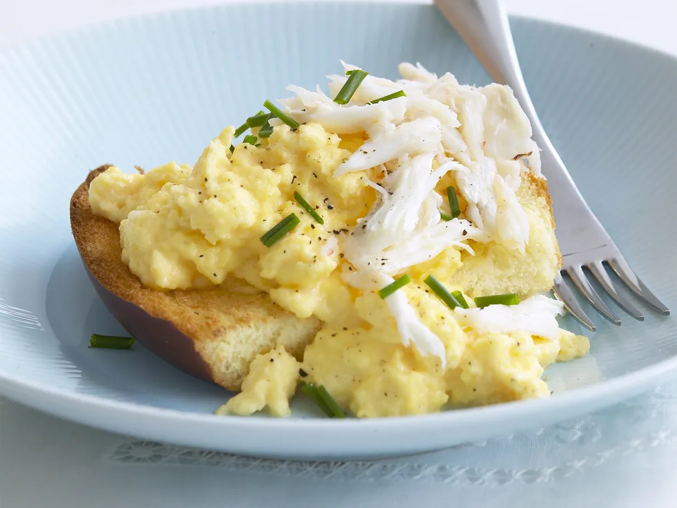 scrambled eggs on brioche with crabmeat