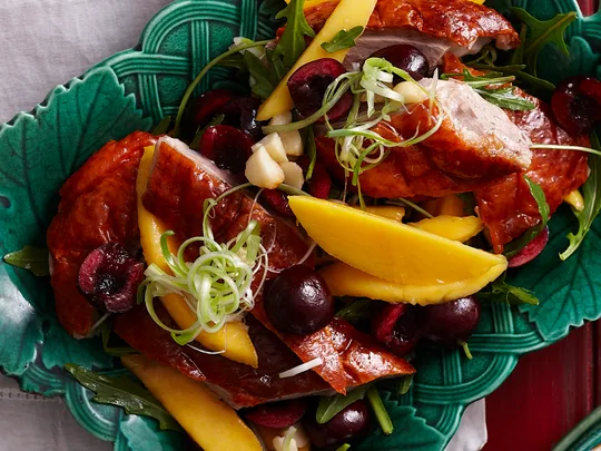 Cheat's duck, cherry, mango and rocket salad