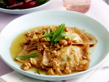 Cheese ravioli with burnt butter and walnut sauce
