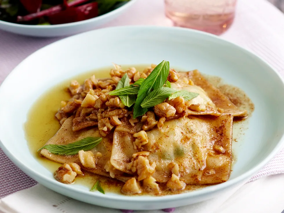 Cheese ravioli with burnt butter and walnut sauce