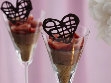 Chocolate and strawberry cheesecake in a glass