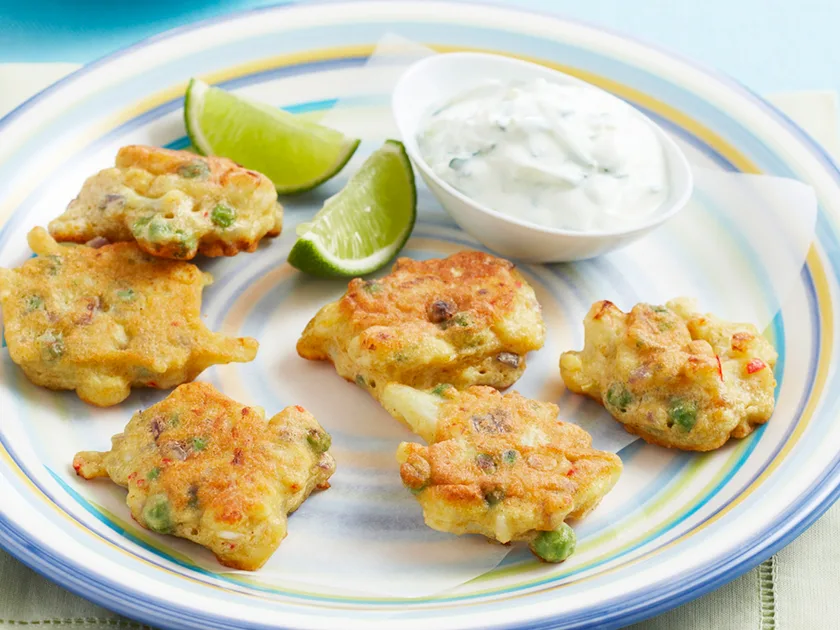 Indian cauliflower fritters with cucumber raita