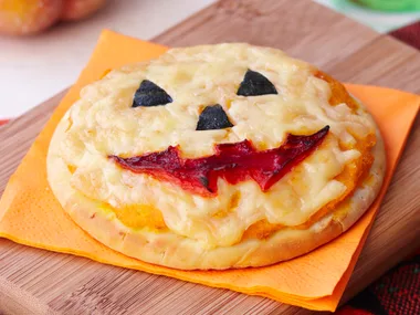 Jack O'Lantern pumpkin pizza
