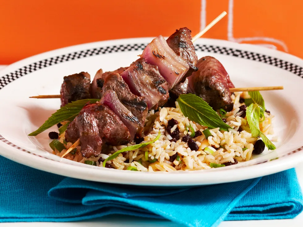 Minted rice salad with kebabs