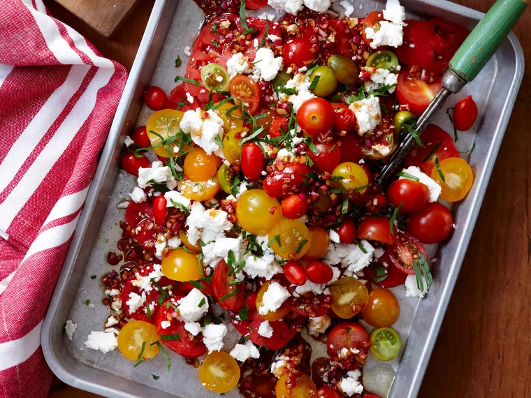 Mixed tomato salad with pomegranate dressing