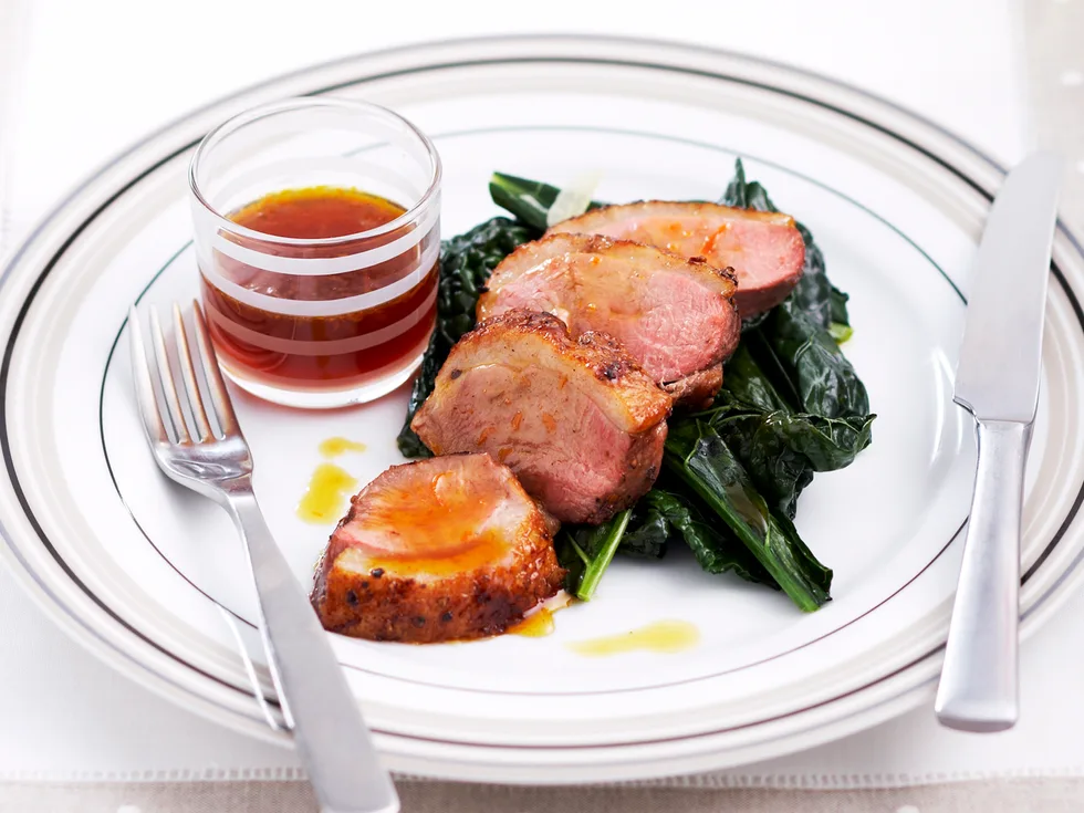 Orange duck breasts with Tuscan cabbage
