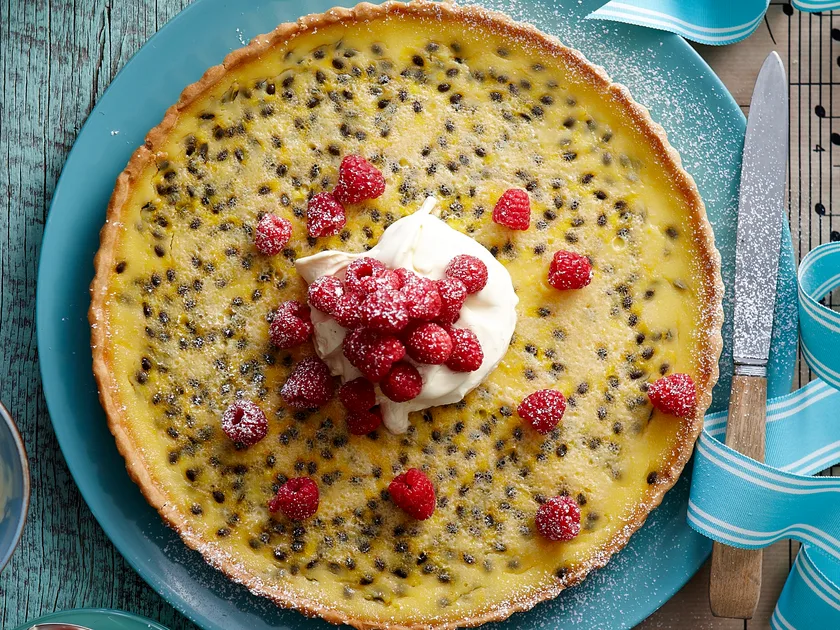 Passionfruit tart with raspberries